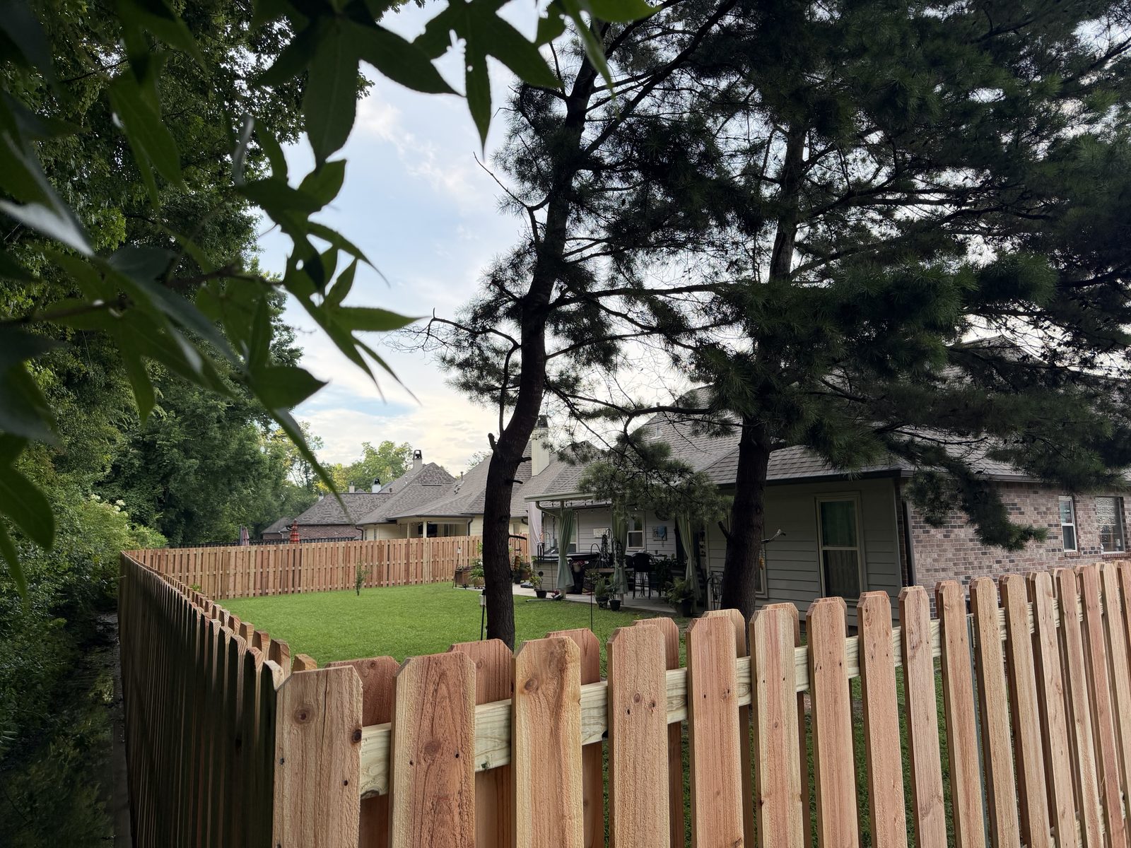 Cedar shadowbox fence around a back yard